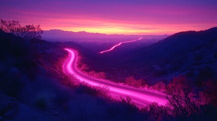 Winding road at twilight, vibrant pink light trails