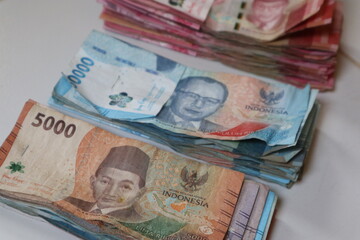 Stacks of Indonesian Rupiah Banknotes Illustrating Financial Concepts, Economy and Wealth