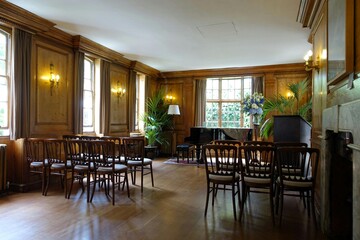 Wood-panelled music room located at Burgh House, New End Square in Hampstead, London

