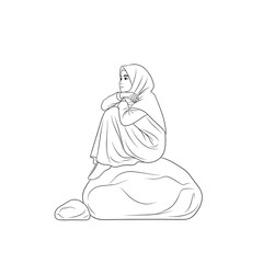 Muslim Girl Sitting Alone with Covered Legs