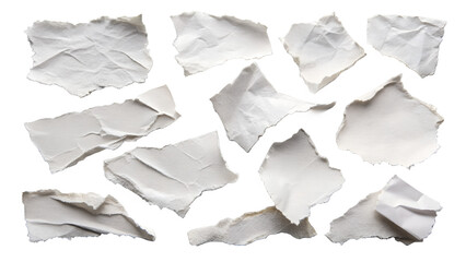Obraz premium A collection of torn and crumpled paper scraps scattered against a plain transparent background