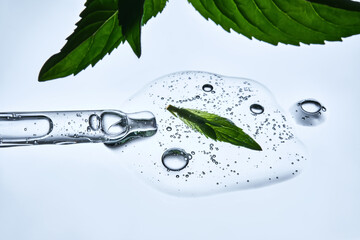 A drop of face serum or mint leaf gel.