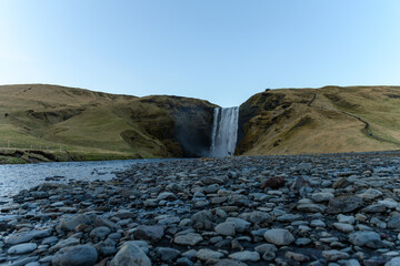 Famous Skogafoss waterfall in Iceland in early evening sun