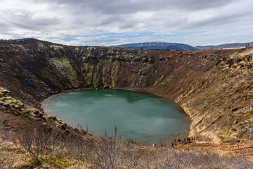 Lake at bottom of Kerid crater in Iceland stock picture