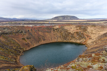 Lake at bottom of Kerid crater in Iceland stock picture