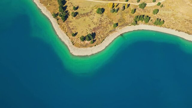 Aerial view of Lake Tekapo turquoise shoreline
