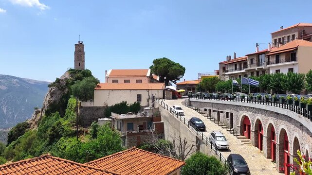 Panoramic view of the picturesque mountain village of Arachova, a popular winter destination in Greece known for its charm, ski resorts, and traditional stone houses.