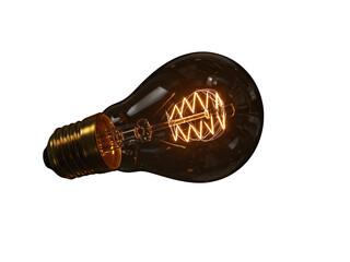 Glowing filament Edison bulb lies on its side its golden base casting light in a dark background