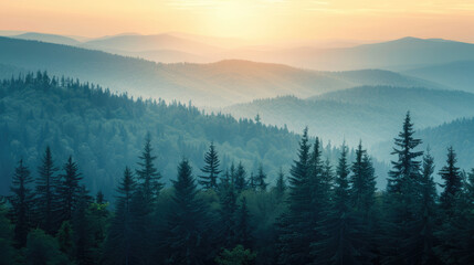 Obraz premium Scenic mountain range landscape with layers of forested hills disappearing into the hazy sunrise sky.