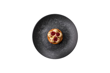 Sweet cake or tart round with cream and raspberries. Raspberry sweet tart