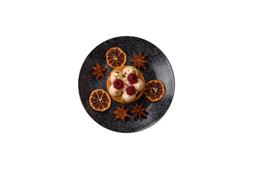 Sweet cake or tart round with cream and raspberries. Raspberry sweet tart