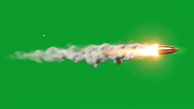 A bullet flies across a green screen trailing smoke and fire