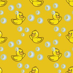 Fototapeta premium seamless pattern with yellow duck in the bubbles and with a plain background.