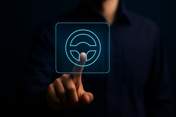 Futuristic touchscreen interface with neon steering wheel icon pressed by hand in dark environment for driving technology and innovation concept