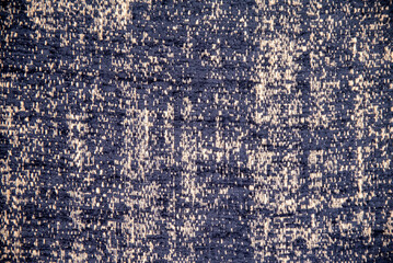 Textile texture with dark blue abstract woven pattern