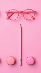 Pink aesthetic flat lay with glasses pencil and macarons for creative inspiration