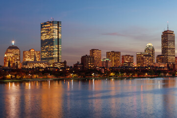 Affluent Back Bay neighborhood skyline and Charles river at night, Boston, Massachusetts, USA