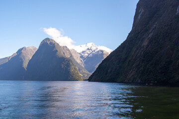 Serene Fjord Landscape with Snow-Capped Mountains