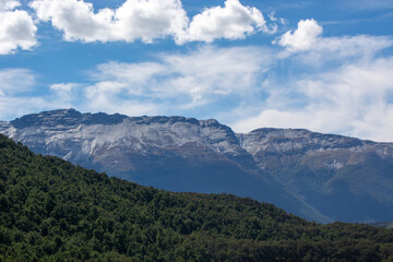 Fototapeta premium Scenic Mountain Landscape Under Blue Sky