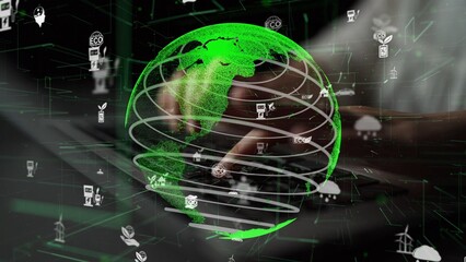 This image depicts a vibrant green earth intertwined with digital technology symbols, highlighting...
