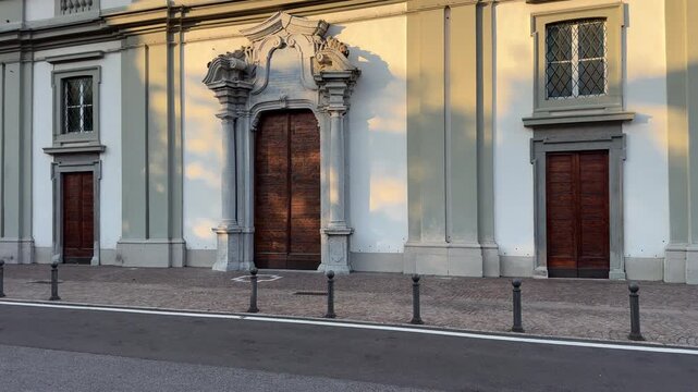 Lecco Church of Saints Gervasius and Protasius &ndash; 4K footage of historic Catholic church, religious architecture, cultural heritage, Lombardy Italy, spiritual landmark, travel destination