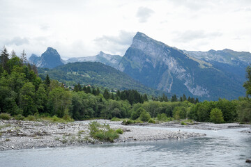 Glacial river winds through a dramatic mountain landscape