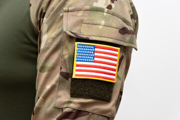 Fototapeta premium Military uniform with the flag of the United States of America on a white background.