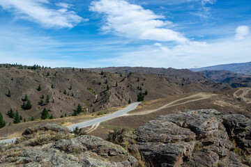Scenic Rugged Landscape with Winding Dirt Road