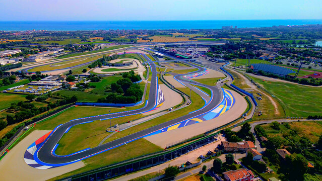 Driving school. Aerial view of the race track open for motorcycle training. Asphalt road. Drone footage. Group of motorcyclists on motorcycles. Motorsport. Italy, Misano, 21.07.2025
