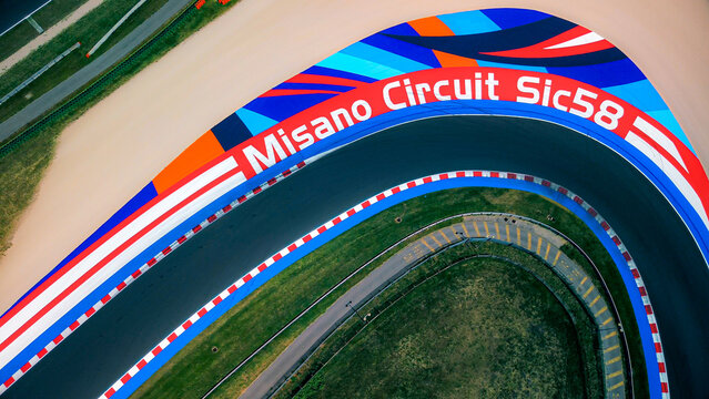 Driving school. Aerial view of the race track open for motorcycle training. Asphalt road. Drone footage. Group of motorcyclists on motorcycles. Motorsport. Italy, Misano, 21.07.2025