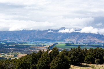 Scenic Mountain Landscape Under Cloudy Sky