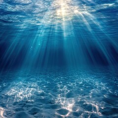 Obraz premium Sunlight Rays Underwater on Sandy Ocean Floor