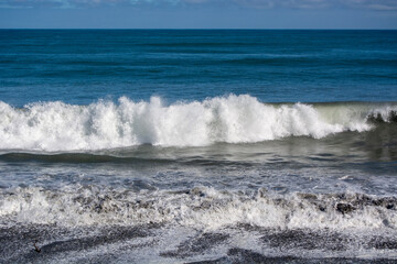 Ocean Waves Crashing on Rocky Shore