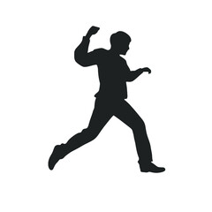 Silhouette in Motion: A dynamic silhouette of a man in mid-stride, embodying action and determination, is captured in a stark, yet compelling, monochrome composition.