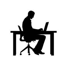 Silhouette of a man sitting at a desk, working on a laptop computer, in a side view.