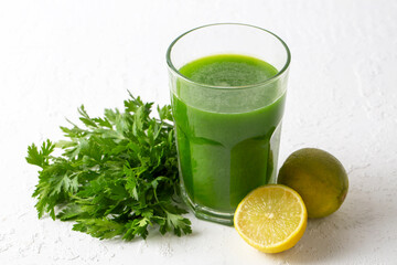Green healthy detox, lemon and parsley juice. Green vegetable smoothie