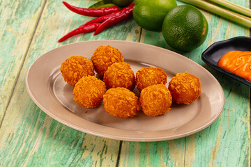 Fried crispy yellow cheese balls