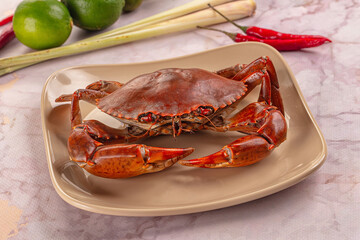 Gourmet steamed crab served lime