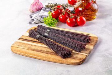 Raw black rice noodles lines