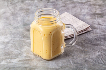 Sweet mango smoothie dessert glass