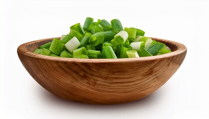 73 chopped spring onions neatly arranged in a wooden bowl isolated on a clean white background the bright fresh green color of the onion pieces contrasts with the earthy tones of the wood