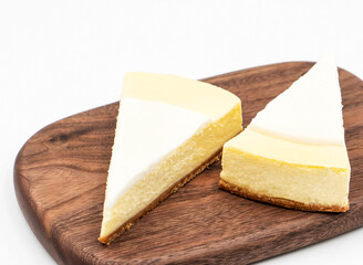 Classic New York Cheesecake Slices on Wooden Board side view of Delicious Dessert