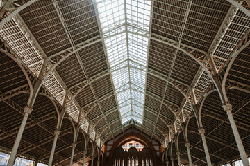 Glass Roof and Iron Arches Inside Colon Market Valencia