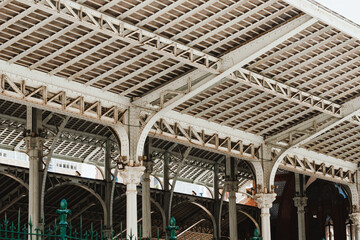 Iron Trusses and Arches Under Roof Geometric Pattern