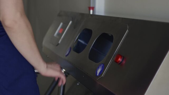 Greenhouse worker using a hand scanner for access control