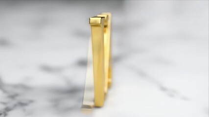 Gold letters "VA" rest on white marble, angled shot - Powered by Adobe