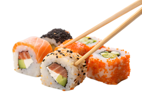 Close up of assorted sushi rolls with chopsticks holding one roll against a black background image