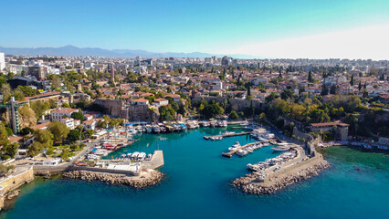 Fototapeta premium Aerial view of the Ottoman Houses and Old Antalya Marina in Kaleici of Antalya, Yivli Minaret