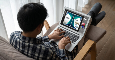 Graphic designer software for modern design of web page and commercial ads showing on the computer screen