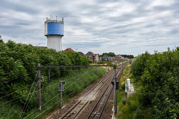 Railway tracks and water tower landscape in Wetteren, East Flanders, Belgium